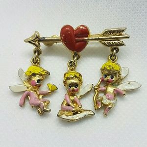 Vintage baby Cupid's love brooch